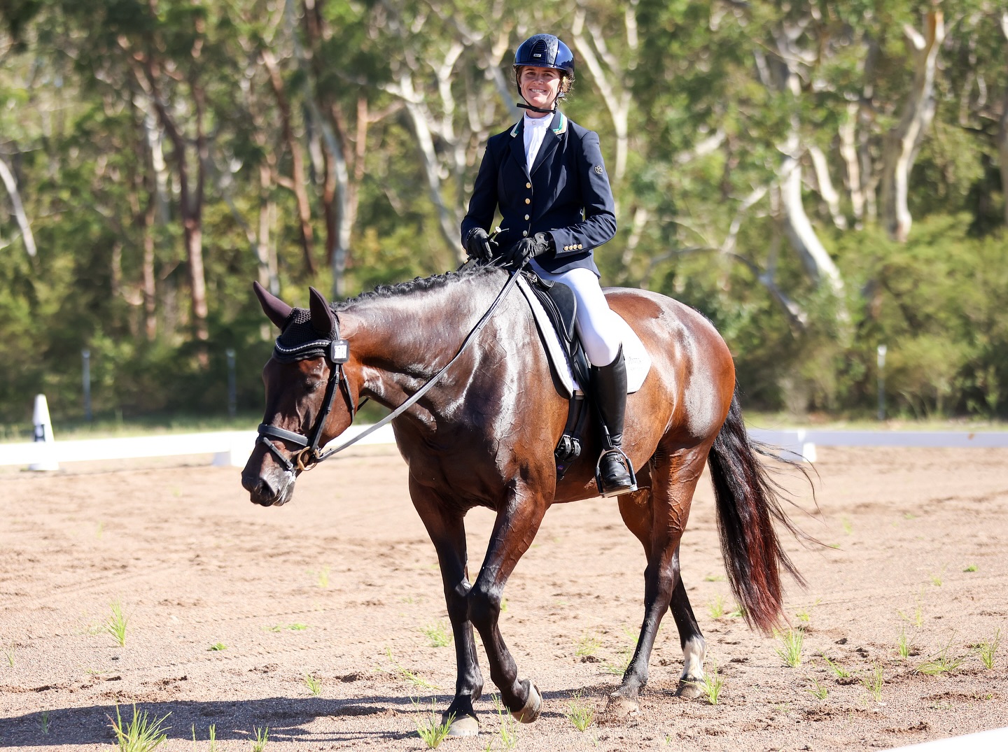 Hazel Shannon riding a horse in a relaxed training setting